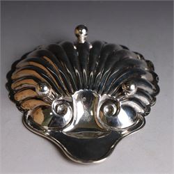 Edwardian silver clam shell butter dish, upon three bun feet, hallmarked James Deakin & Sons, Sheffield 1910