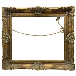 Frame: 20th century ornate gilt swept frame aperture 50cm x 60cm