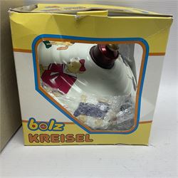 Twenty six tinplate models to include Ferris Wheel and Performing Circus Elephant, marked JW, further similar examples such as Duck on a Bike, Clown on Roller, Carousel; Popeye Tin Speedboat; Looney Tunes Wind Up Cars and Express Train; various international examples, MS107 Jumping Bambi, Pop Pop Boat, jumping frogs, pecking chickens etc; both boxed and loose