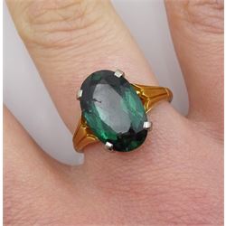Gold single stone green paste ring, stamped 18ct