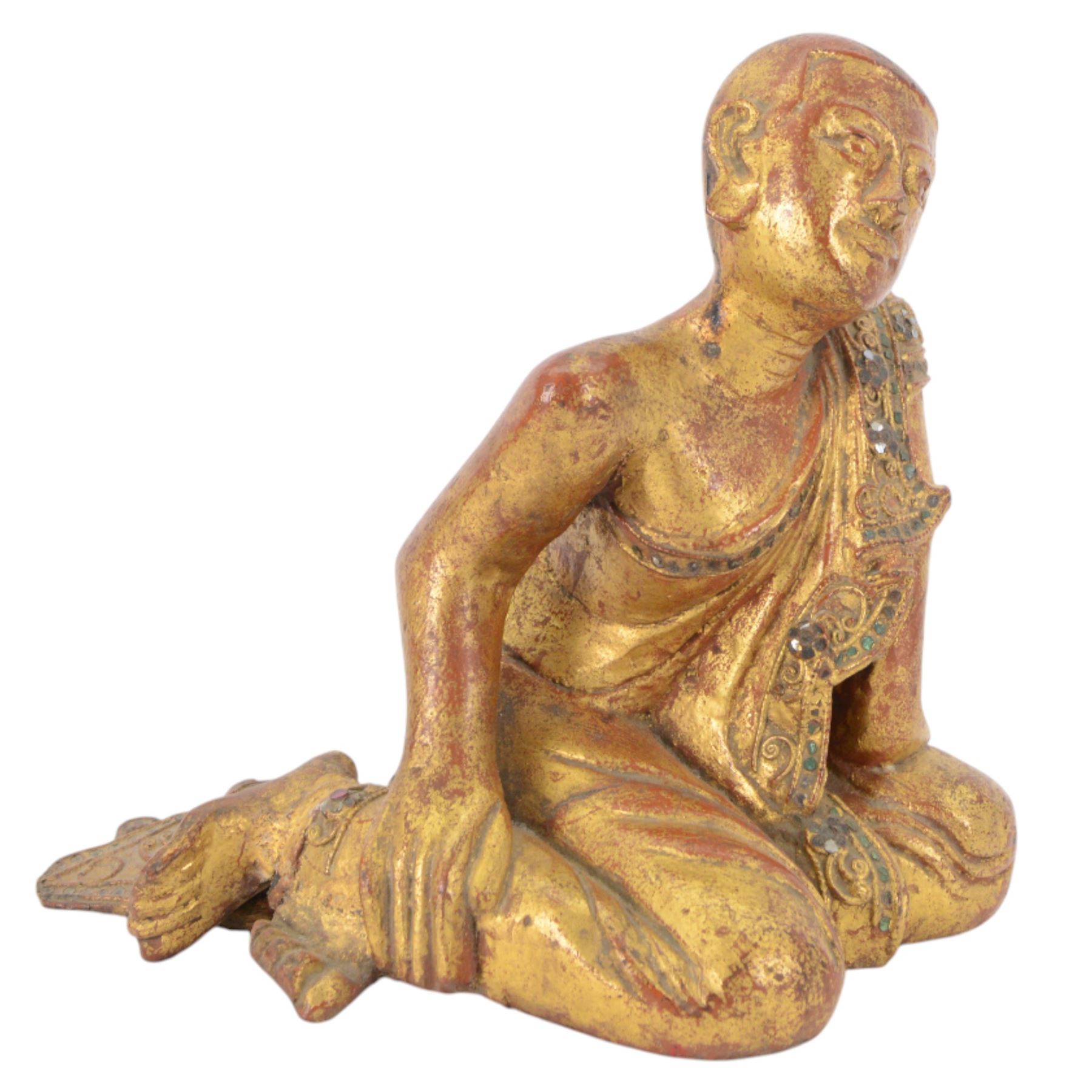 Late 19th century two Burmese Mandalay lacquered and gilt wood figures of monks, the robes edged with colored glass inlay and leafy scroll bands in raised lacquer, H25cm