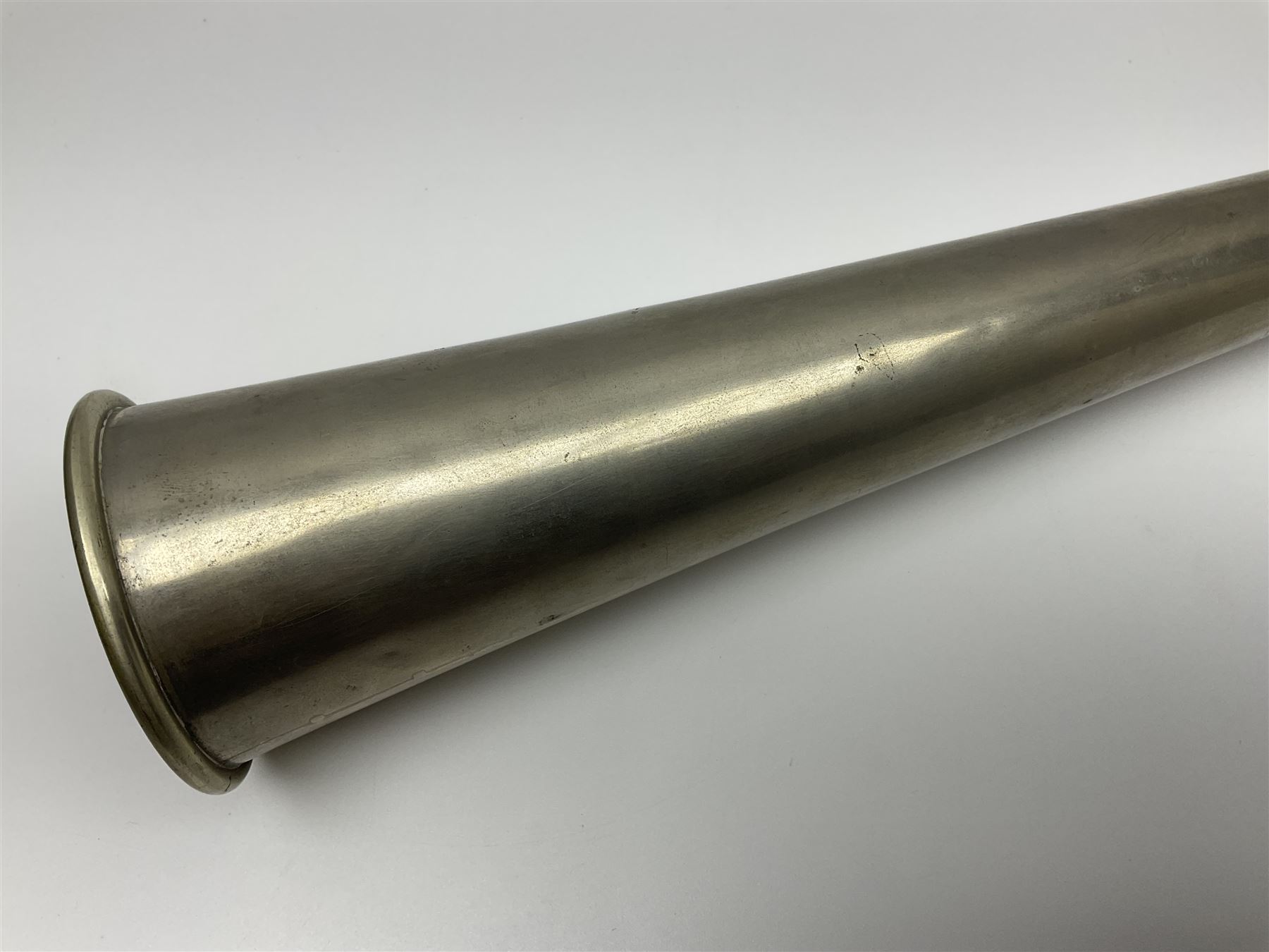 19th century telescopic hunting horn, the bell engraved 'The Beaufort', with makers mark Kohler & Son, makers, 61 Victoria Street, Westminster (from Covent garden) London, in a leather sheath, horn full extended L91cm 