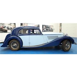 1939 MG SA Saloon

Registration: GRB 988
Chassis number: SA2983
Engine number: QPHG3242 (original engine)
Engine: 2,322cc six-cylinder petrol
Transmission: Manual
Odometer reading: 71,873 miles
Seating: Five
Colour: Two-tone blue
Former keepers: 6/7 recorded
V5C: Present
Keys: One

A 1939 MG SA Saloon, finished in an attractive two-tone blue colour scheme and retaining its original UK registration, GRB 988.

Introduced in 1936, the MG SA was the marque's prestigious sporting saloon, combining elegant coachwork with refined six-cylinder performance and luxurious accommodation. This example retains its original 2,322cc engine, numbered QPHG3242, and displays 71,873 miles on the odometer, although this mileage has not been independently verified.

The car is understood to have undergone an extensive rebuild and restoration between 2010 and 2015 and is today presented in showroom condition throughout. The coachwork has an excellent finish, complemented by outstanding chrome brightwork, wire wheels, a rear-mounted spare wheel, folding rear luggage rack and a desirable folding canvas sunroof. The engine bay is immaculately detailed, while the underside, chassis and suspension all reflect the high standard of restoration undertaken. A stainless-steel exhaust system has also been fitted.

The luxurious cabin features beautifully finished inlaid wood veneer, leather seating and period instrumentation, all presenting to an exceptionally high standard.

A particularly appealing aspect of this MG SA is its documented participation in the 1952 Daily Express National Motor Rally. Accompanying the vehicle are the original official rally programme together with period photographs showing the car competing in the event displaying entrant number 36. The programme lists entrant No. 36 in Class D.2 as an MG 2322cc, providing excellent documented provenance linking this car to one of Britain's best-known post-war motoring events, held between 12th and 15th November 1952.

Combining documented provenance with exceptional cosmetic presentation, this MG SA represents a rare opportunity to acquire one of MG's flagship pre-war sporting saloons.

At the time of cataloguing the vehicle started and ran well.

Features

• Original 2,322cc six-cylinder engine
• Manual transmission
• Original UK registration
• Two-tone blue coachwork
• Folding canvas sunroof
• Leather interior
• Inlaid wood veneer dashboard and trim
• Wire wheels
• Rear-mounted spare wheel
• Folding rear luggage rack
• Twin carburettors
• Stainless-steel exhaust system
• Extensive rebuild and restoration completed between 2010 and 2015

History and Documentation

• Approximately six to seven former keepers recorded
• Original engine (No. QPHG3242)
• Chassis No. SA2983
• Original UK registration
• Extensive rebuild and restoration completed between 2010 and 2015
• Original 1952 Daily Express National Motor Rally programme
• Period photographs showing the vehicle competing as Entrant No. 36
• V5C registration document not present
• One key

Condition

Presented in exceptional showroom condition, this MG SA has clearly benefited from a high-quality restoration completed to an impressive standard. The paintwork, chrome, interior, engine compartment and underside are all exceptionally well presented, reflecting the considerable work undertaken.

The vehicle started and ran well at the time of cataloguing. It has not been subjected to a full mechanical inspection by the auctioneers, and prospective purchasers should satisfy themselves as to the vehicle's condition, originality, mileage, specification and roadworthiness prior to bidding.

This vehicle forms part of the Estate of the late John Sills and is offered for sale by the Executors, providing a genuine reason for sale.