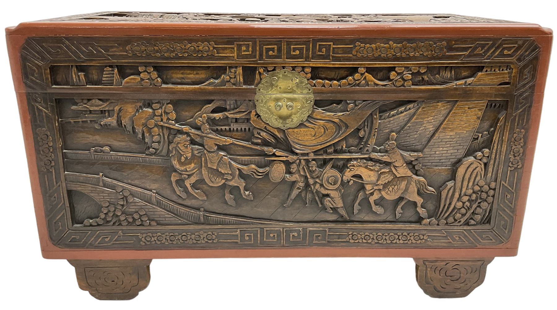 Mid-20th century Singapore camphor wood blanket chest, heavily carved depicting battle scenes and cityscapes 