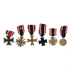 WWI and WWII German medals, including Iron Cross 2nd Class, War Merit cross with swords, C...