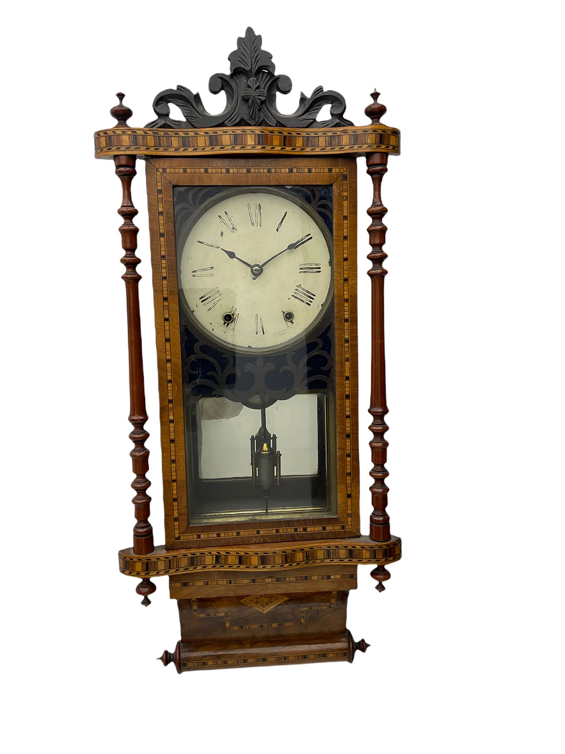 A late 19th century spring driven American Eightday wall clock