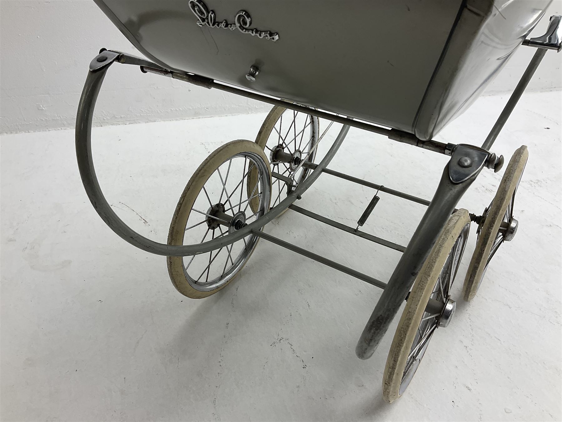 Silver Cross coach built doll s pram with green fold down hood and cover sprung tubular frame chrome and white handle four spoked wheels with brake mattress pillow and bedding L97cm Toys Models