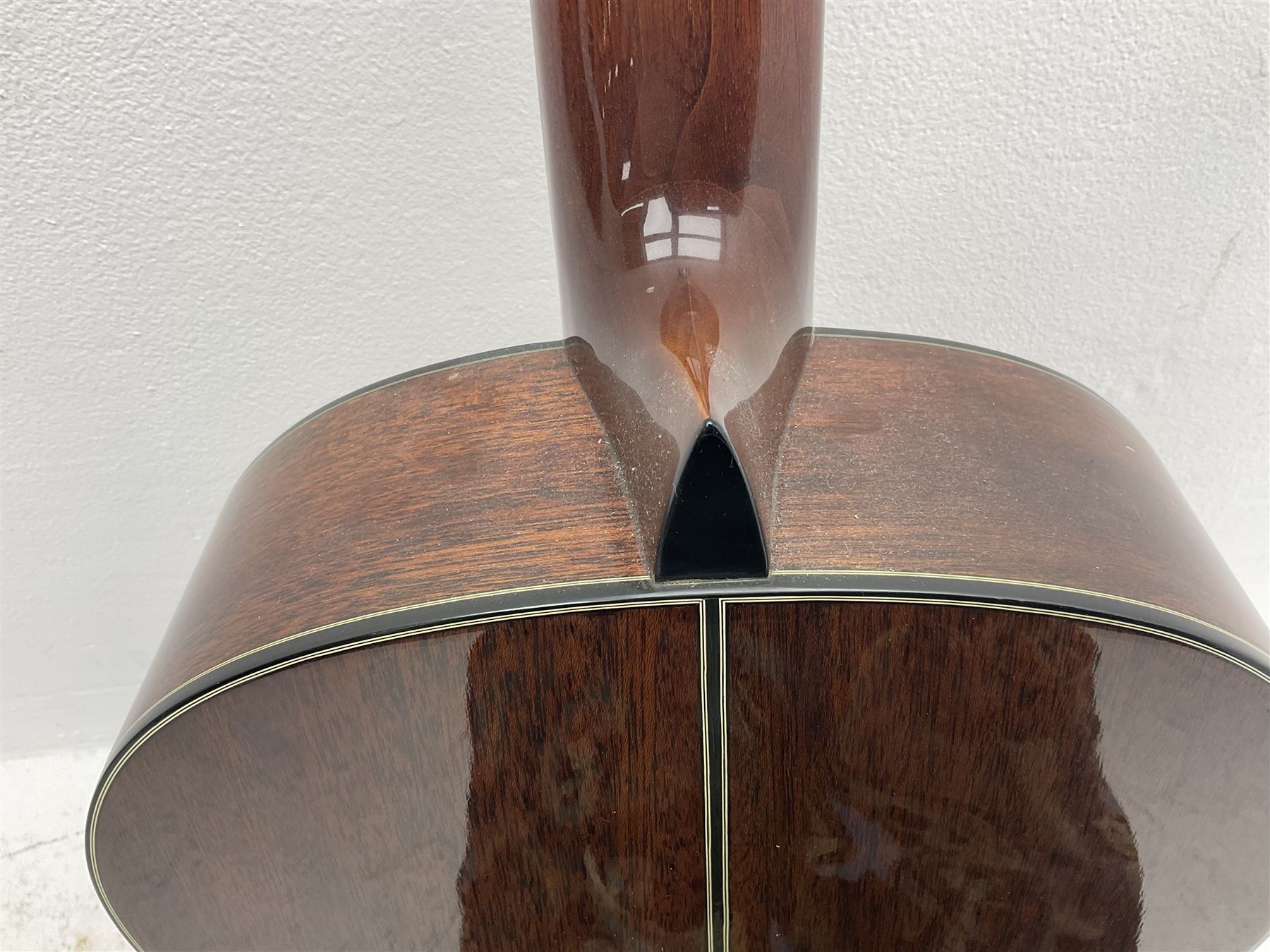 Nagoya Suzuki Model SC240 acoustic guitar with mahogany back and ribs and spruce top, bears label, L101cm; in soft carrying case