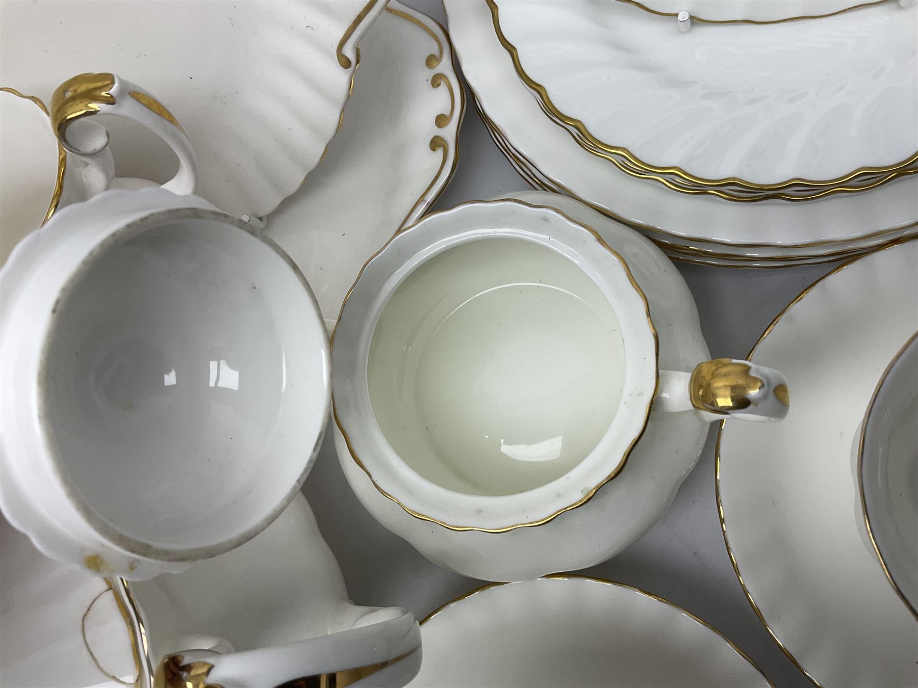 Royal Albert Val D'or pattern tea service for six, comprising teapot, milk jug, sucrier, six teacups and saucers, tea plates, side plates, dessert plates, etc (33)