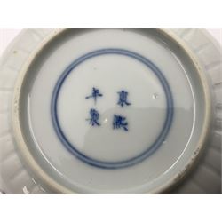 18th century Chinese blue and white Kangxi teacup and saucer, decorated with dancing figures, four character Kangxi mark beneath, saucer D10cm