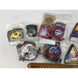 Mostly American cloth badges, including cavalry, airborne division, desert storm, special forces etc