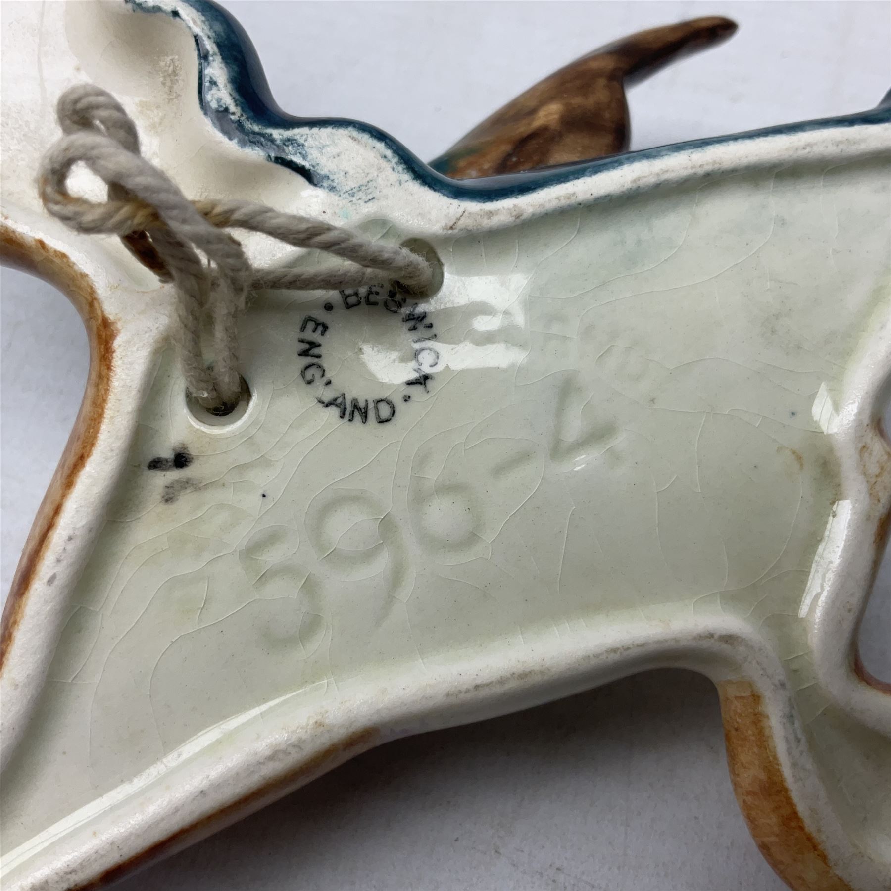 Set of five Beswick graduated wall mounting figures of flying ducks, models from 596/0 to 596/4, largest L29cm