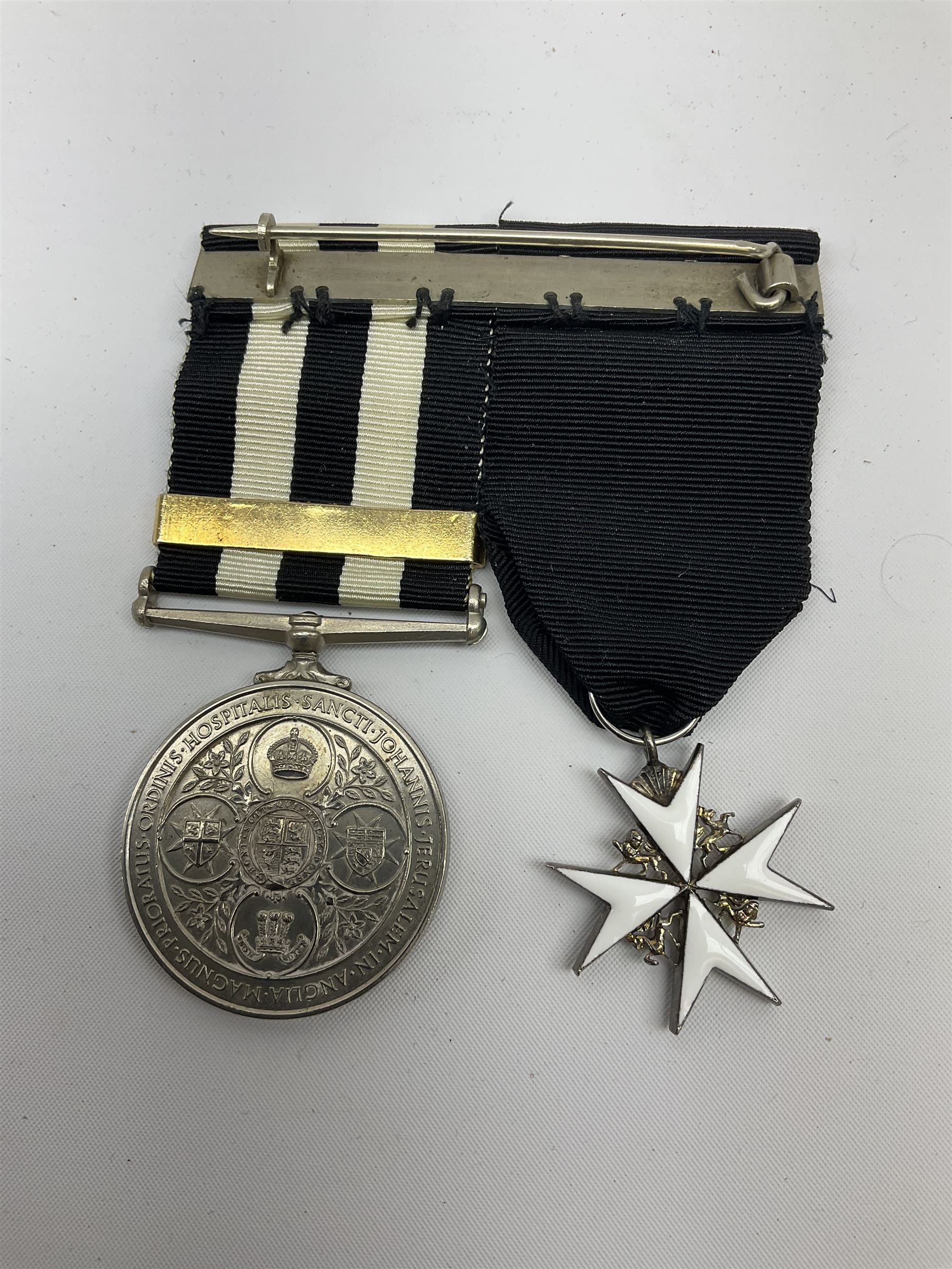 St John's Ambulance Brigade Service medal of the Order of St John and Order of St John enamelled badge
