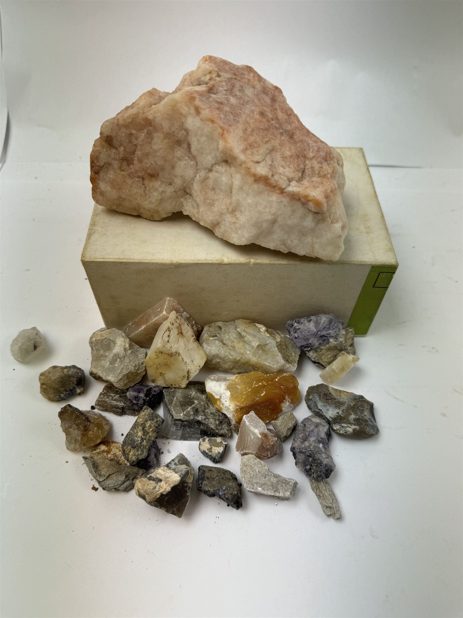 Collection of raw Blue John specimens, together with other mineral specimens