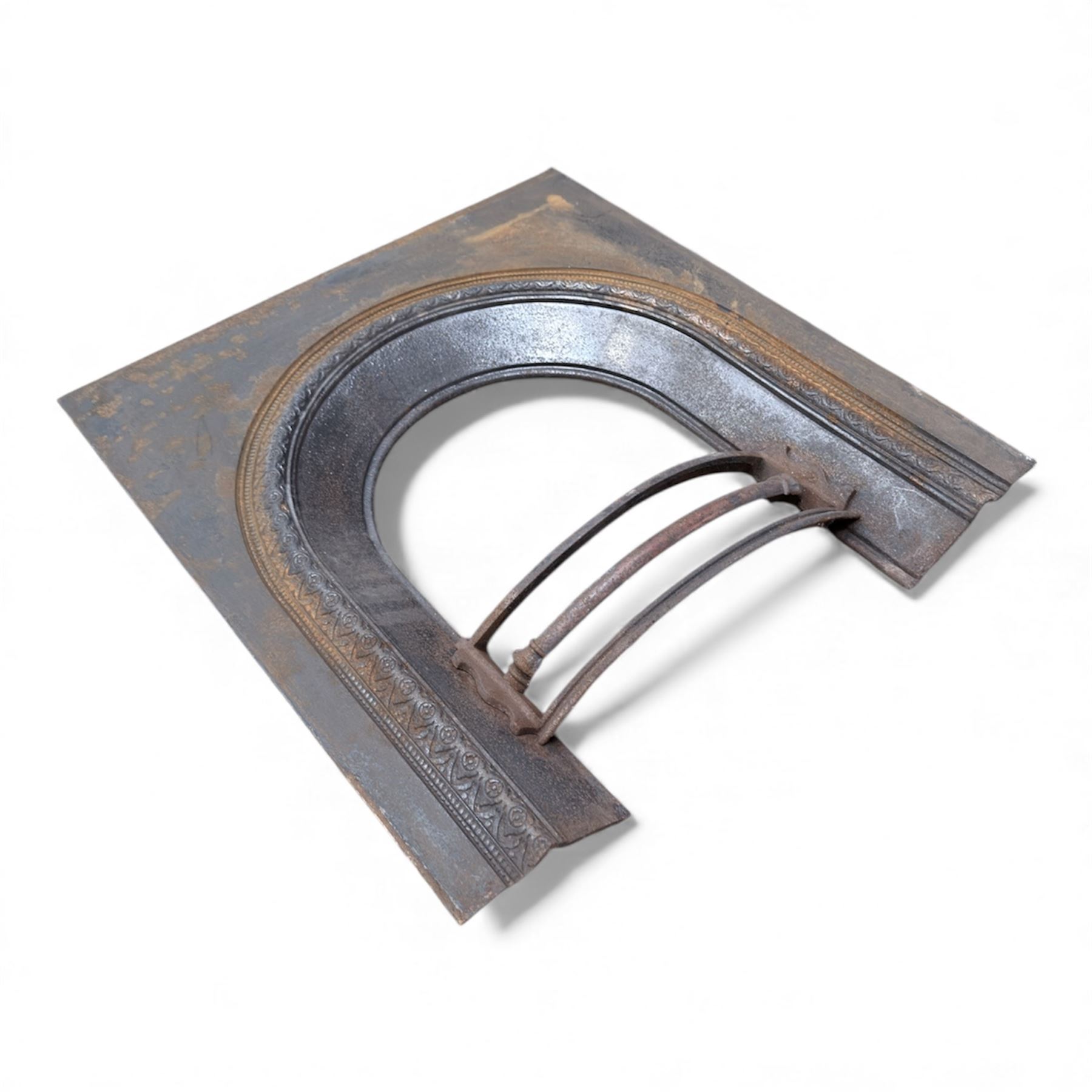 Two cast iron fire surrounds / inserts along with four metal surround pieces 