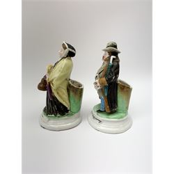 A pair of Victorian figural table vesta and match strikers, modelled as a man and woman, entitled I Am Starting For A Long Journey, and I'm Off With Him. 