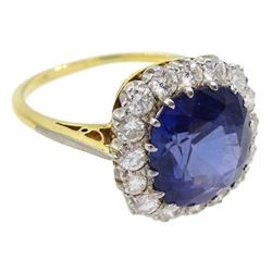 18ct gold cushion cut unheated sapphire and diamond cluster ring, the sapphire measuring approx 10.3mm x 9.5mm depth approx 5.5mm