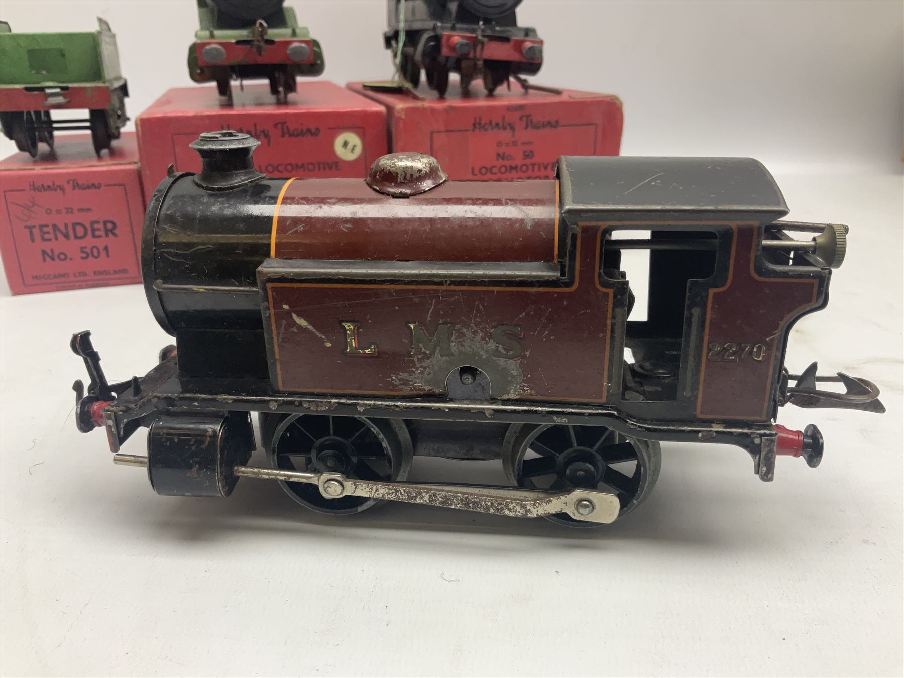 Hornby '0' gauge - No.501 clockwork 0-4-0 locomotive No.1842; boxed; No.501 Tender; boxed; No.101 clockwork 0-4-0 locomotive No.2270; and No.50 clockwork 0-4-0 locomotive No.60199 for spares or repair; boxed (4)