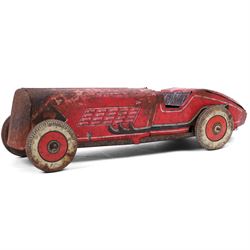 Mettoy tinplate clockwork racing car, the boat tailed red body with lithographed details, ...