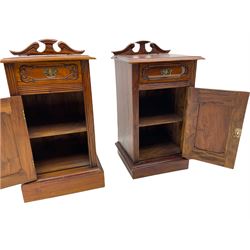 Pair Victorian style hardwood bedside cabinets, fitted with single drawer and cupboard, the doors carved with floral urns, on plinth bases