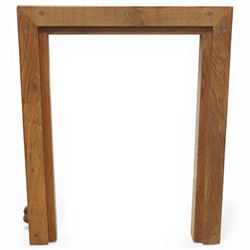 Beaverman - oak fire surround, moulded edge surrounding a rectangular aperture, with carved beaver signature, by Colin Almack of Sutton near Thirsk