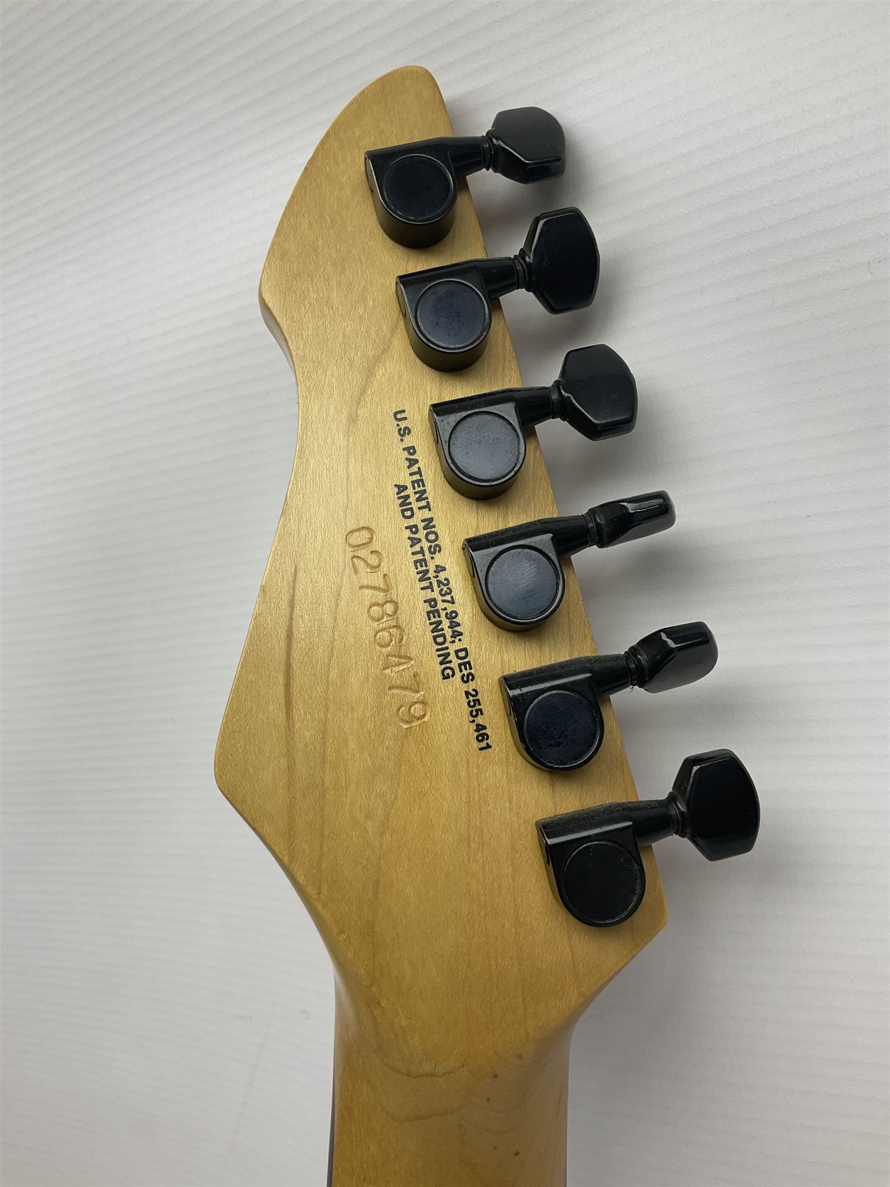 American Peavey Nitro 1 hand-made electric guitar in red with Kahler tremolo, serial no.02786479, L98cm overall; in soft carrying case.