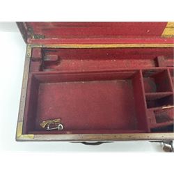 Leather shotgun case, the red baize lined interior with the trade labels of Westley Richards & Co., London, a brass plaque inscribed 'T Nevin, Mirfield, Yorkshire' to cover, with key, case to fit barrel 76cm (30 inches)  
