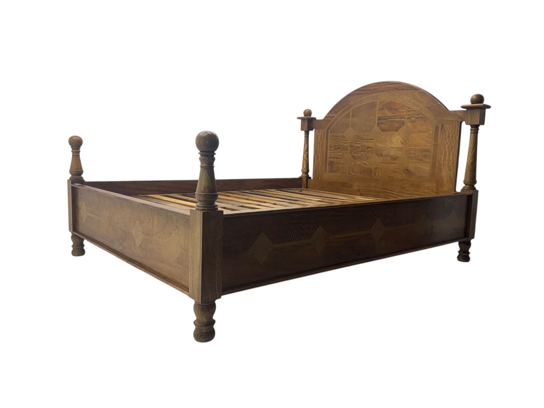Contemporary mango wood bed frame, comprising an arched panelled headboard and footboard with inlaid geometric patterns, turned posts with spherical finials, and complete with side rails and slatted base