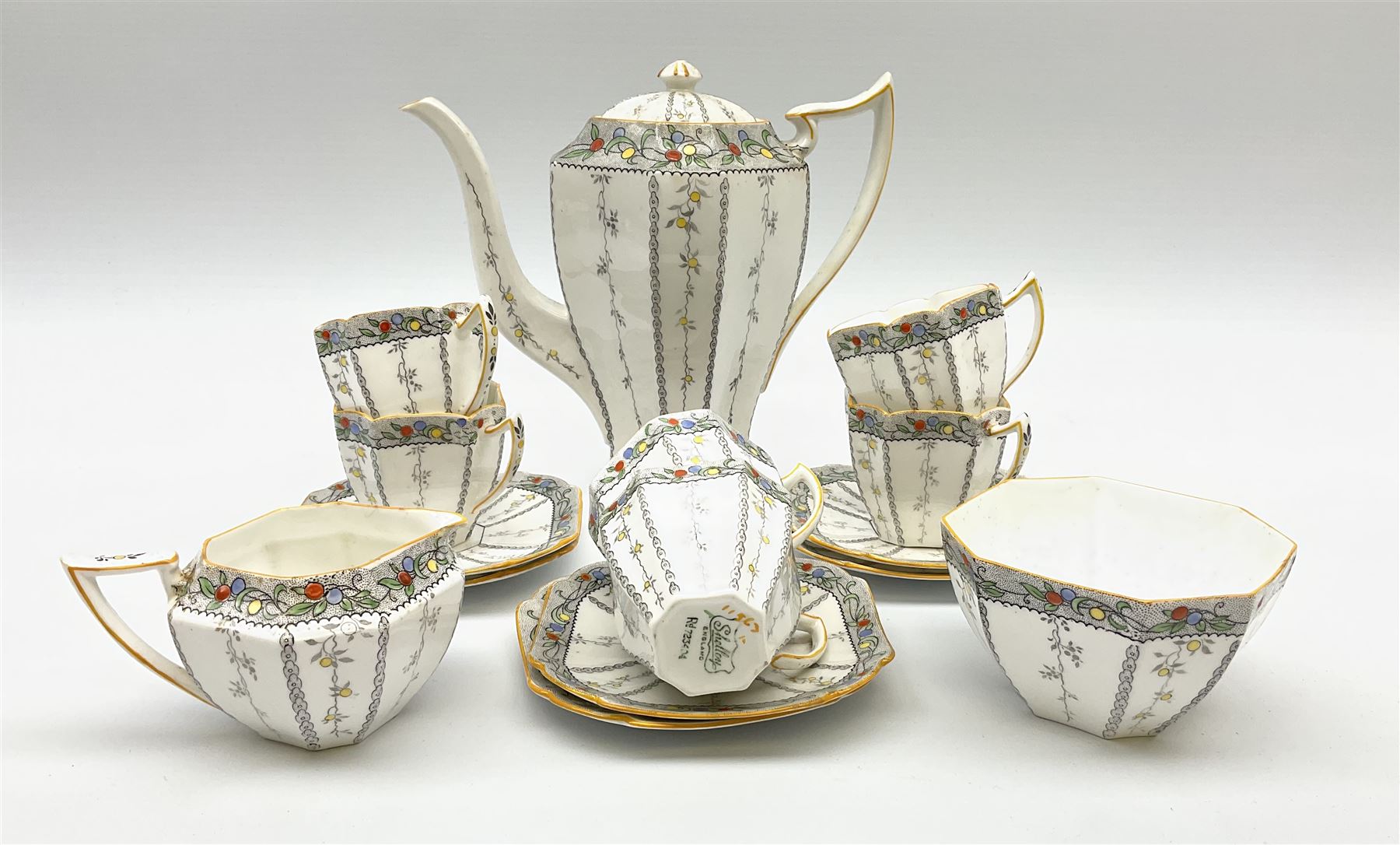 An Art Deco Shelley Queen Anne shape coffee set for six decorated