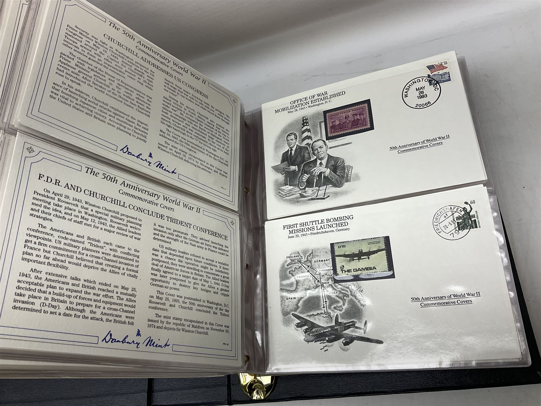 Three albums of 'The 50th Anniversary World War II Commemorative Covers Collection', housed in the official Danbury Mint folders