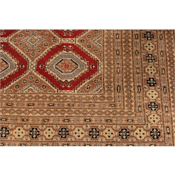  Persian Bokhara design hand knotted red ground rug, stepped lozenge, W320cm, L420cm  
