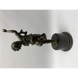 After E Plat, bronze modelled as a dancing child, signed E. Plat, upon cylindrical black marble base, H40cm