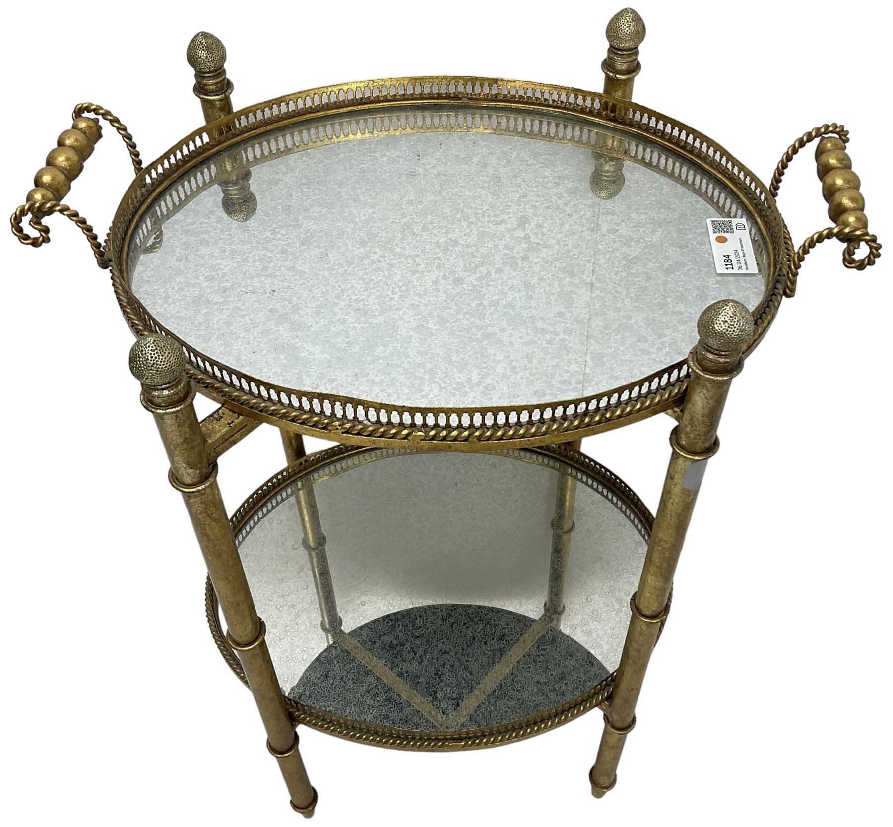 Gilt metal oval stand, two mirrored tray tiers with raised pierced galleries