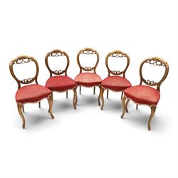 Set of five Victorian mahogany dining chairs, the scalloped balloon back with pierced scro...
