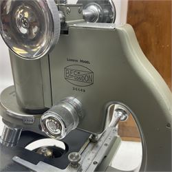 Four microscopes, including Cooke, Troughton & Simms no M467926, W Watson & Sons no 114758, W & J George & Beck Ltd no 36649 and one other 