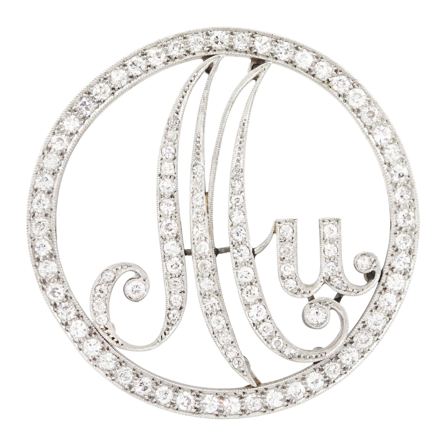 Art Deco platinum and diamond initial brooch, the circular frame and initials 'Mu' milgrain set with old cut diamonds, total diamond weight approx 2.40 carat