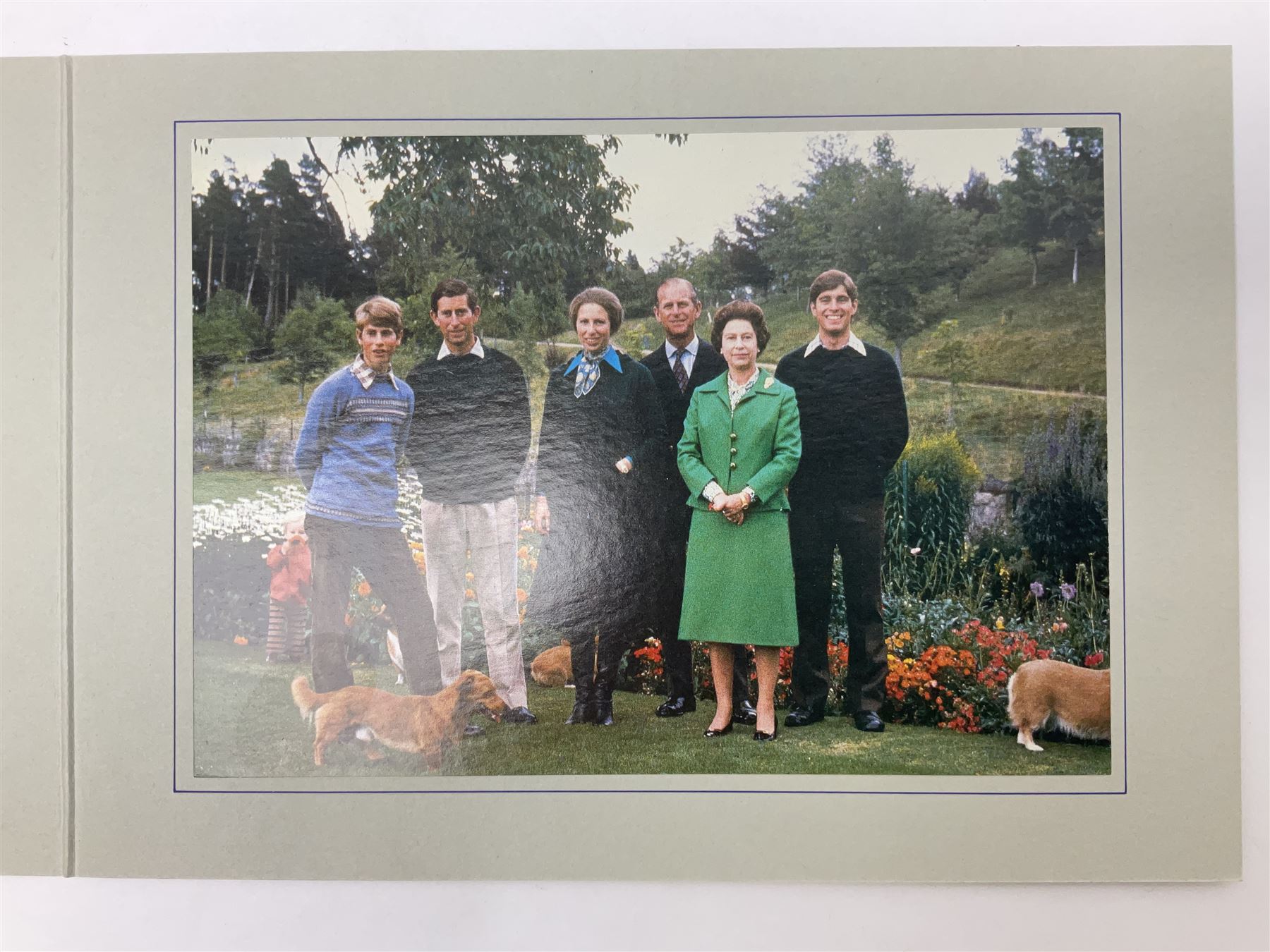 H.M. Queen Elizabeth II and HRH The Duke of Edinburgh, signed 1979 Christmas card with twin gilt ciphers to cover, colour photographic print of the Royal family standing in a garden, signed ‘Elizabeth R and Philip’ with manuscript date 1979 below