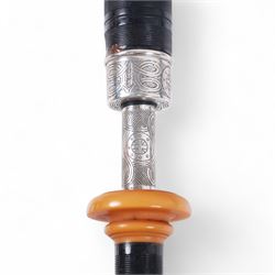 Set of late 20th century silver mounted bagpipes, the turned ebonised hardwood drone rods with Celtic knot and stipple engraved silver collars and ivorine mounts, hallmarked Bernie Leigh, Birmingham 1991, with R.G Hardie Glasgow plastic chanter and bag in green and blue Armstrong tartan, contained within a plush lined hard case, with a collection of spare reeds, drone rods, chanter, bags, cleaning accessories and other accessories 