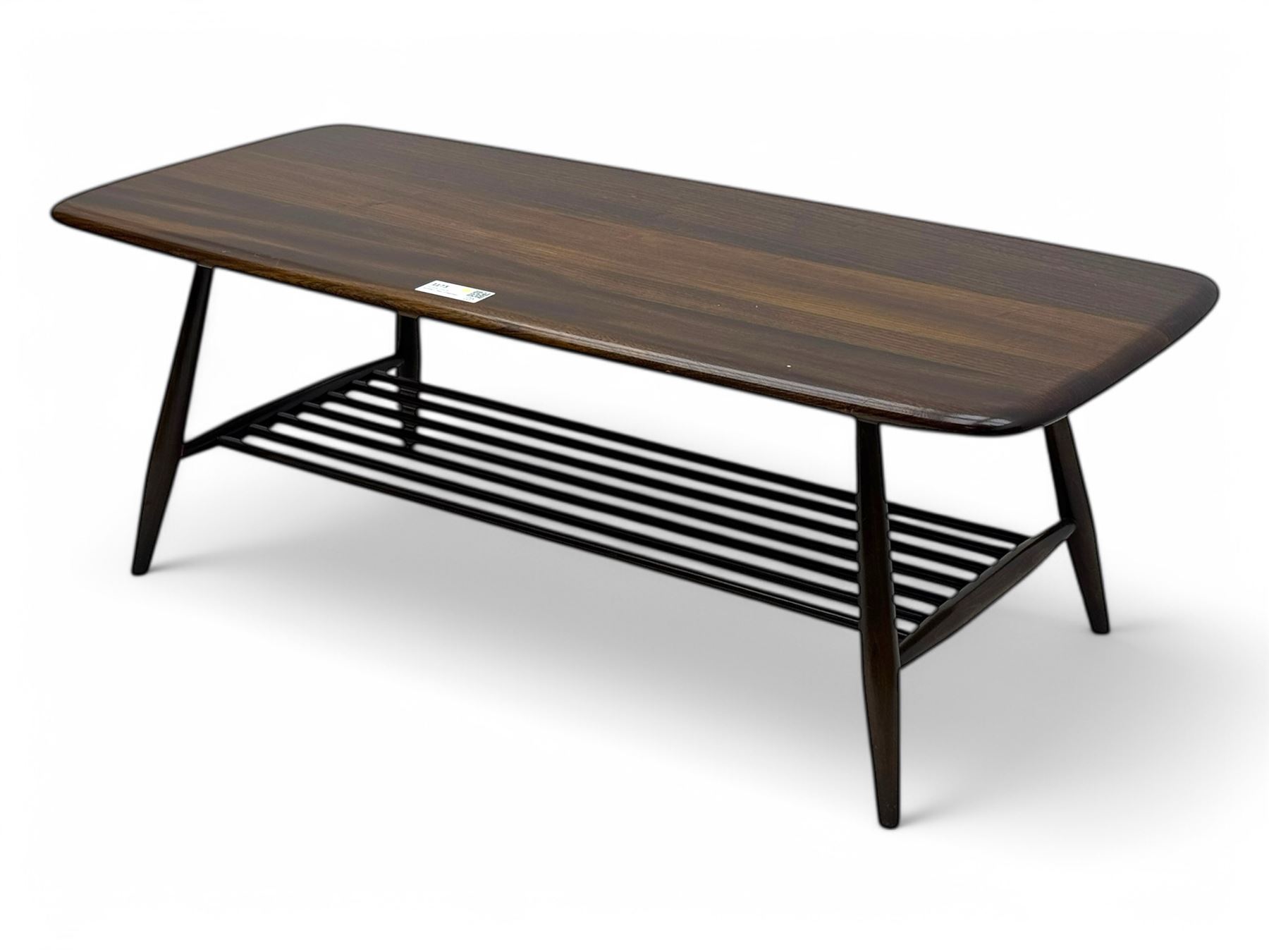 Lucian Ercolani for Ercol - mid-20th century elm 'Windsor' coffee table, rectangular top with rounded corners and chamfered edge, over an integral slatted undertier, on splayed tapering supports