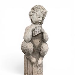 Pair of weathered composite stone garden figures, modelled as a girl and a young satyr playing the panpipes seated on column supports, the fluted columns with climbing ivy vines and surmounted animal, butterfly and other zoomorphic motifs