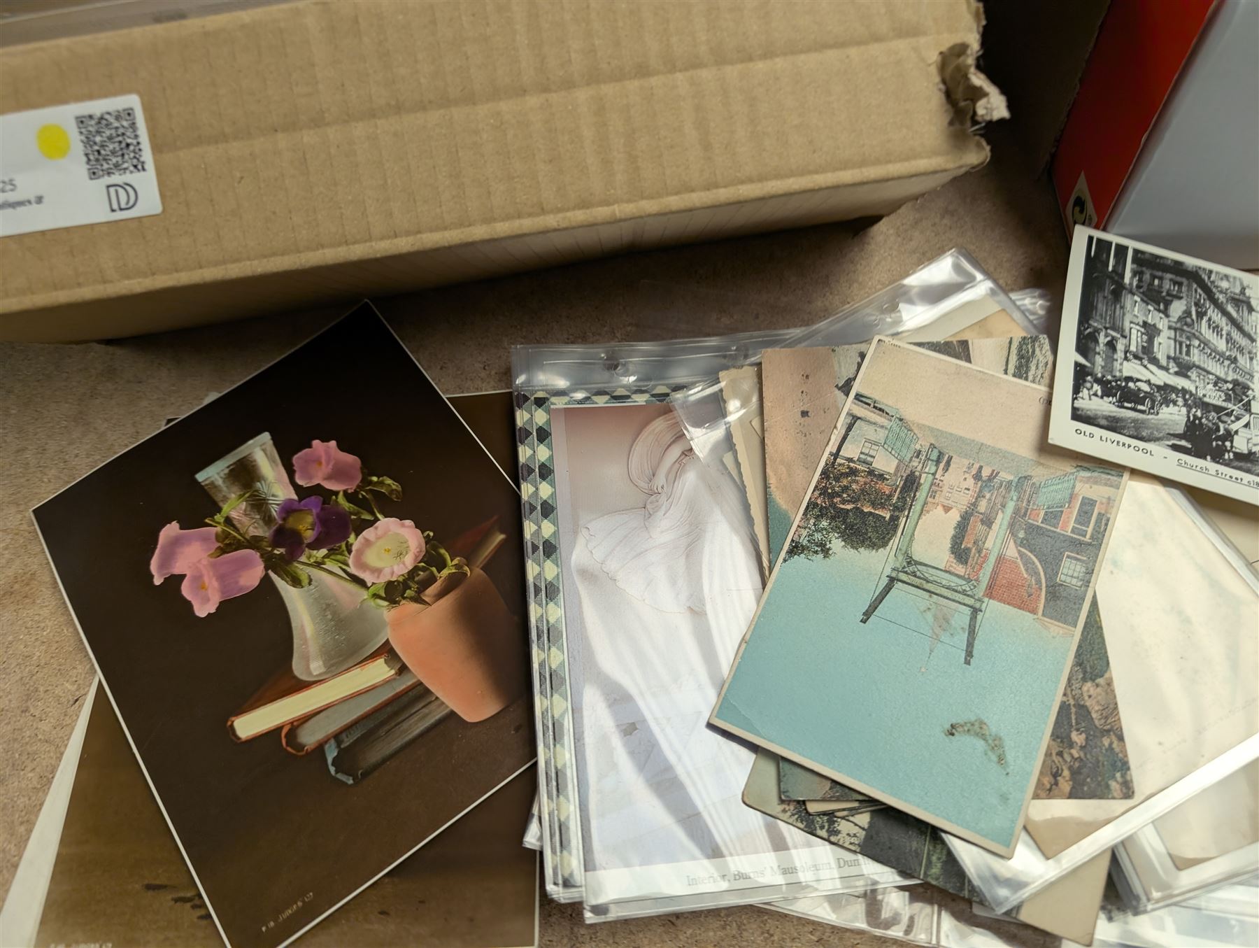 Collection of postcards, mostly early 20th century examples, in two boxes