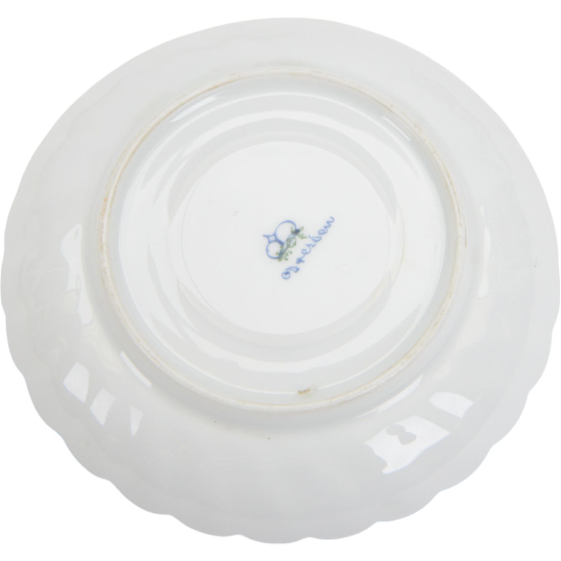 Two Dresden coffee cups and saucers, of fluted form decorated with flora spays together with two matching saucers and two dessert plates, cups H6cm  