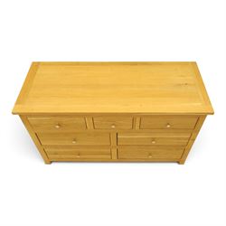 Contemporary light oak chest, rectangular top fitted with three short over four long drawers, on square feet