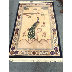 Chinese style blue and beige ground rug, central Peacock, 287cm x 184cm