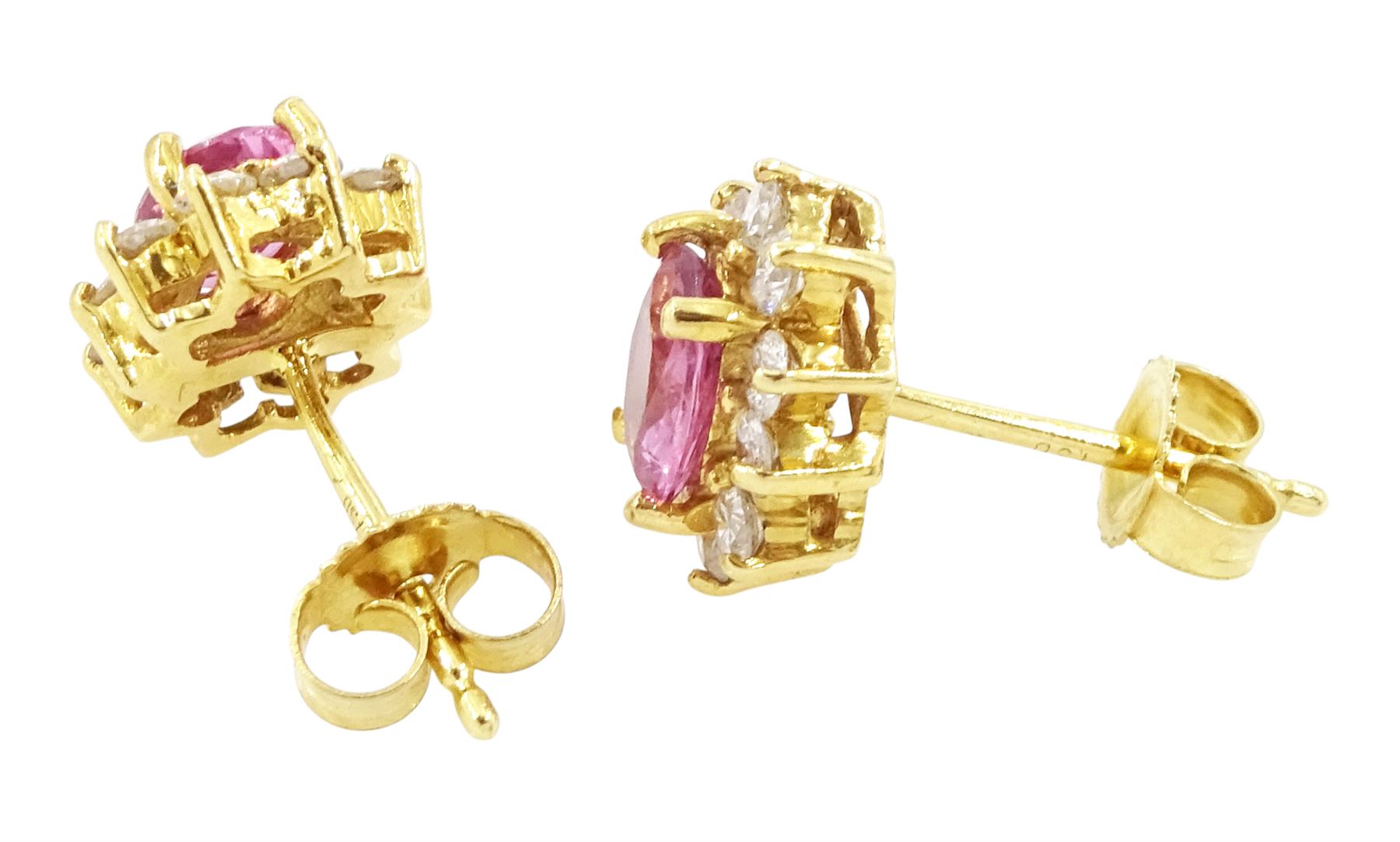 Pair of 18ct gold pink sapphire and diamond cluster earrings, each stud set with an oval cut sapphire, surrounded by ten round brilliant cut diamonds, Birmingham 2006, total sapphire weight approx 1.00 carat, total diamond weight approx 0.60 carat