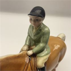 Beswick Boy on Palomino Pony no 1500 and Girl on Skewbald Pony no 1499, both with printed mark beneath 