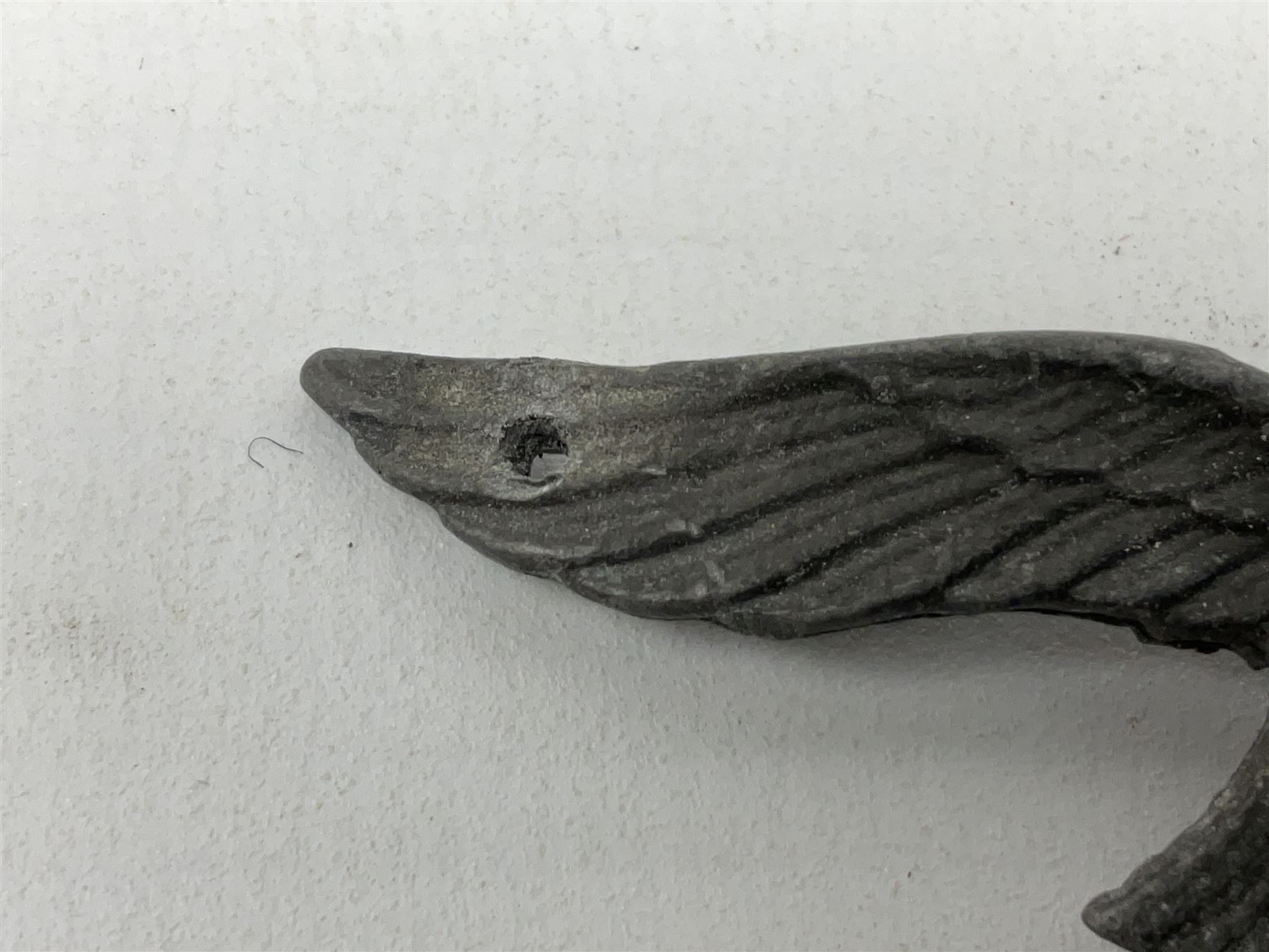 Five WW2 German peaked cap badges, four with double-pinned backs