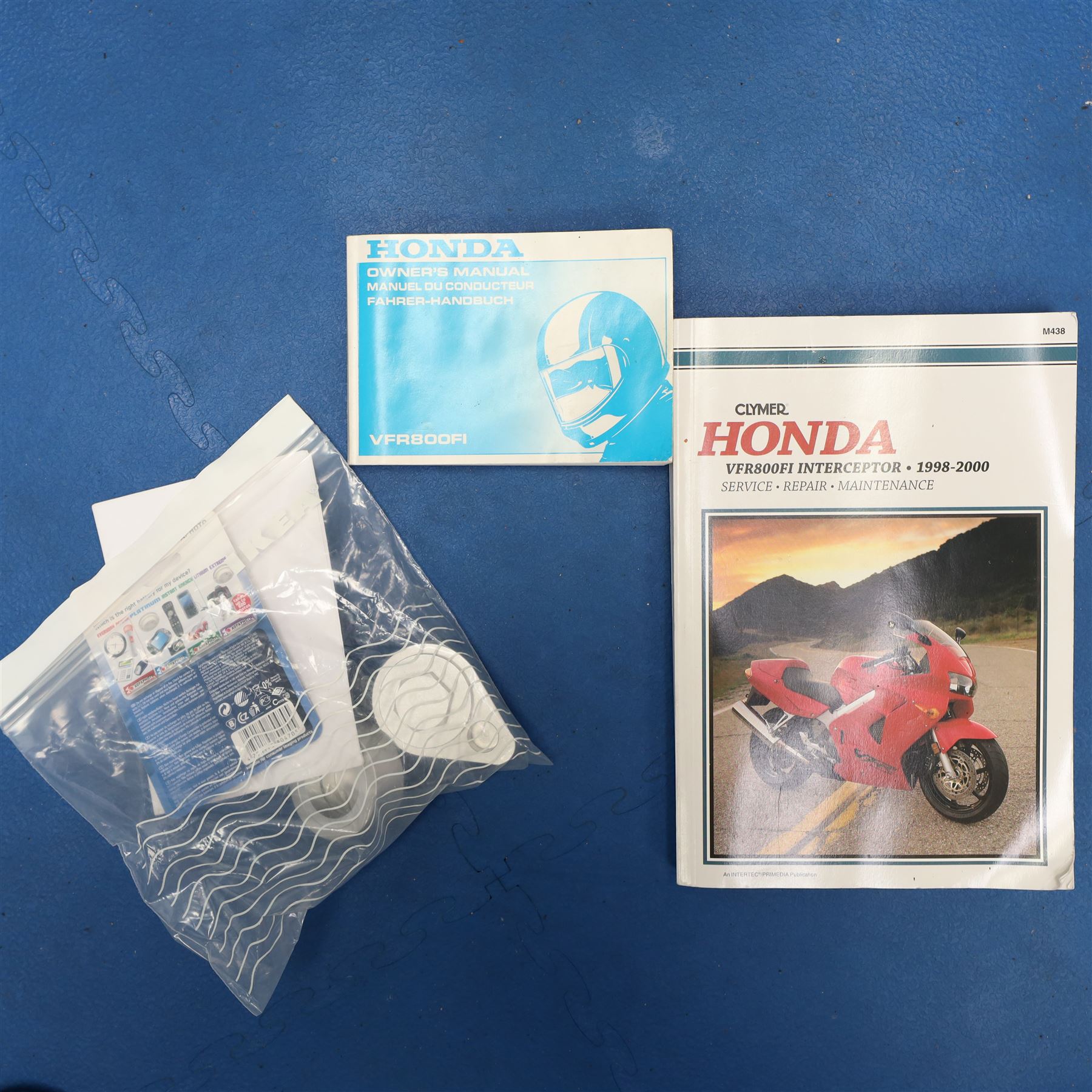 1998 Honda VFR800 FI Sports Touring Motorcycle

• Registration: R145 SUT
• Date of first registration: 1998
• Engine: 781cc V4 petrol
• Fuel system: Honda PGM-FI fuel injection
• Transmission: Manual
• Odometer reading: 11,700 miles
• Colour: Silver with black trim
• V5C: Present
• Keys: Two
• Security: Datatag immobiliser

A well-presented 1998 Honda VFR800 FI sports touring motorcycle, finished in silver with contrasting black trim and displaying a notably low odometer reading of 11,700 miles.

The VFR800 combines Honda’s renowned V4 engine with PGM-FI fuel injection and a combined braking system, creating a capable and refined motorcycle suited to both sporting and long-distance use.

Features include:

• Full factory fairing
• Tinted windscreen
• Honda PGM-FI fuel injection
• Combined braking system
• Twin front brake discs
• Factory exhaust system
• Alloy wheels
• Rear passenger grab handles
• Datatag immobiliser
• Digital instrument display

The motorcycle appears complete and largely original and has been stored indoors. It is presented in good overall condition, with light cosmetic marks consistent with its age and use.

This vehicle forms part of the Estate of the Late John Sils and is offered for sale by the Executors, confirming a genuine reason for sale.
