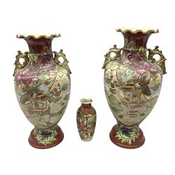 Pair of Japanese satsuma vases of baluster form, with twin handles and polychrome decoration depicting Samurai warriors, and another smaller vase, largest H39.5cm