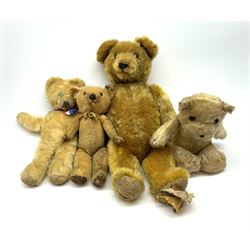 Three 1950s teddy bears including Chiltern dog type looking baby bear with tail, circular felt nose and stitched mouth and jointed limbs H15
